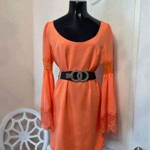 Bebe dress color is peach